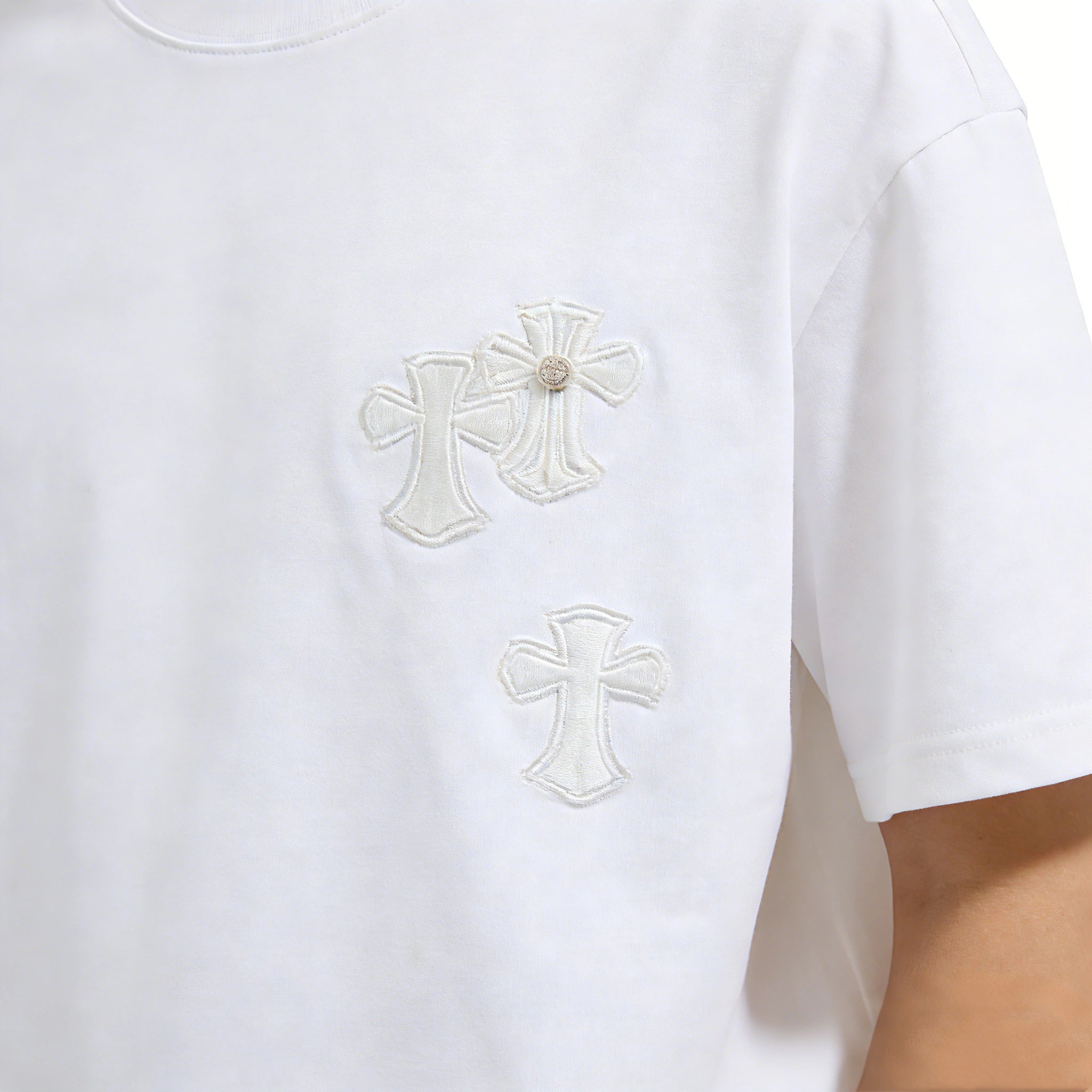 Hand-Stitched Beige Cross Embroidery with Metal Rivet on White Tee