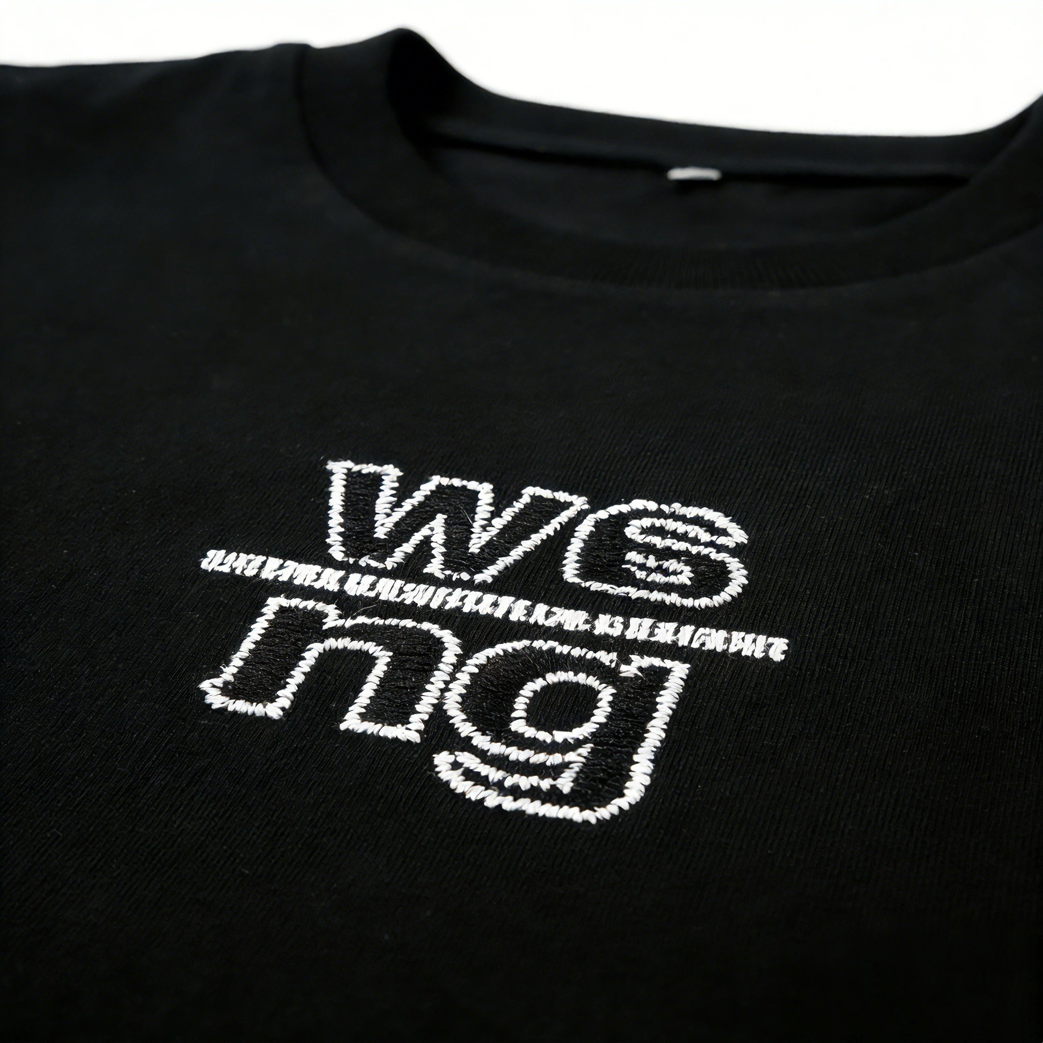 W6 ng Chest Embroidery Detail on Black Oversized T-Shirt